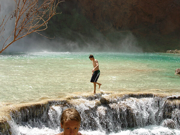 The travertine pools below the falls.