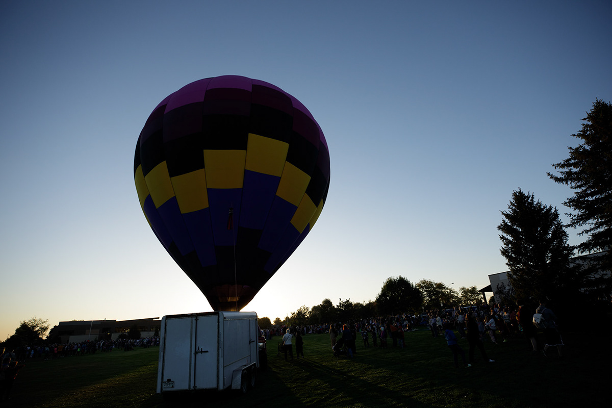 Hot air balloons inflating at dawn in Greeley, Colorado.